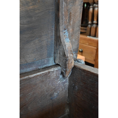 220 - A large antique oak coffer, 126 cm wide x 55 cm deep x 88 cm high