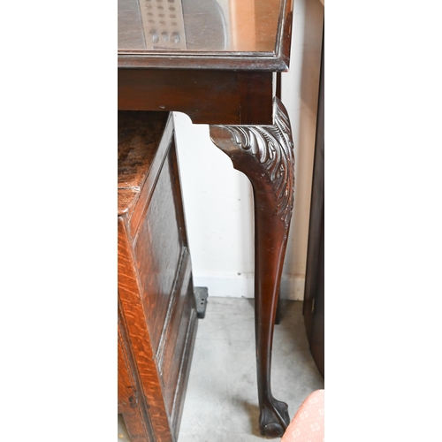 224 - A Georgian style mahogany console table on acanthus carved cabriole supports with ball and claw feet... 