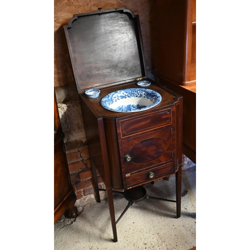 A 19th century mahogany wash stand with hinged top enclosing Copeland Spode's Italian blue and white transfer printed wash set (three piece), 46 cm wide x 44 cm deep x 85 cm high