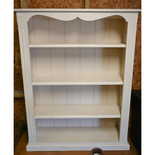 544 - A cream painted open bookcase with three adjustable shelves, 92 cm wide x 28 cm deep x 118 cm high