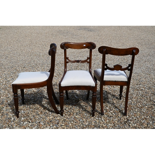 546 - Three Regency mahogany bar back side chairs with calico pad seats on turned and reeded front legs (3... 