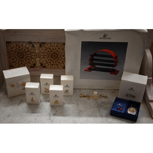 62 - G - Seven boxed Swarovski crystal 'Memories' and 'Classics' collectors ornaments to/w two unboxed ex... 