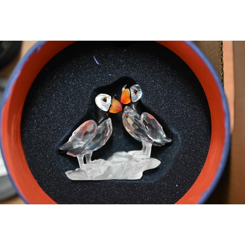 63 - F - Eleven Swarovski crystal glass ornaments including trains, kingfishers, puffins and a heart pape... 