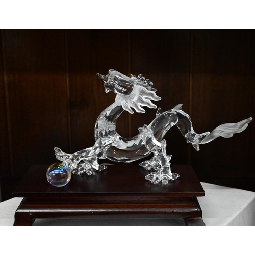 79 - D - Swarovski crystal glass 'Wild Horses' and dragon figures, both boxed to/w unboxed Swarovski 'Lin... 