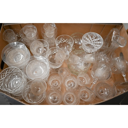 93 - A large quantity of cut and other drinking glasses and tableware to/w two large green serving dishes... 