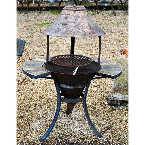 54 - A metal firepit/bbq on stand with tiled surround and metal canopy to/w with a smaller example (2)