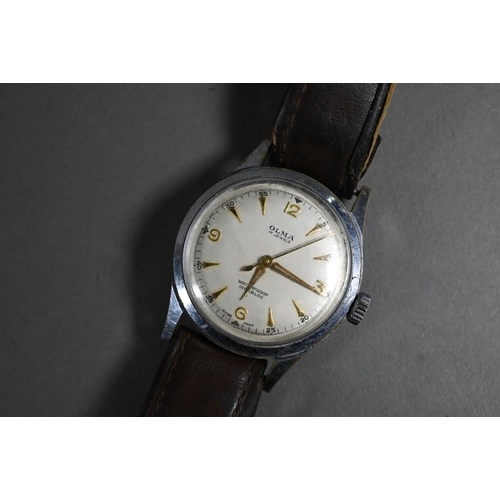 415 - A vintage gents Olma wristwatch, the champagne dial with gilt markers and hands within a 32 mm steel... 