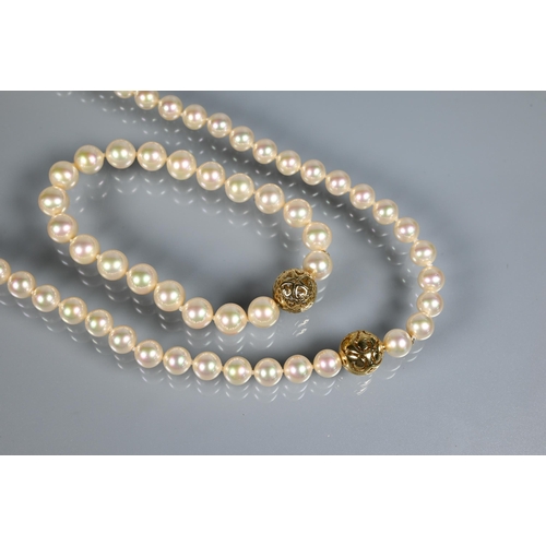 303 - Majorica - A uniform cultured pearl necklace double knotted throughout onto pierced bead-style snap ... 