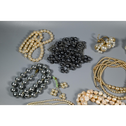 309 - Collection of various simulated and cultured pearl necklaces, various colours, lengths, sizes etc (b... 