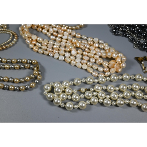 309 - Collection of various simulated and cultured pearl necklaces, various colours, lengths, sizes etc (b... 