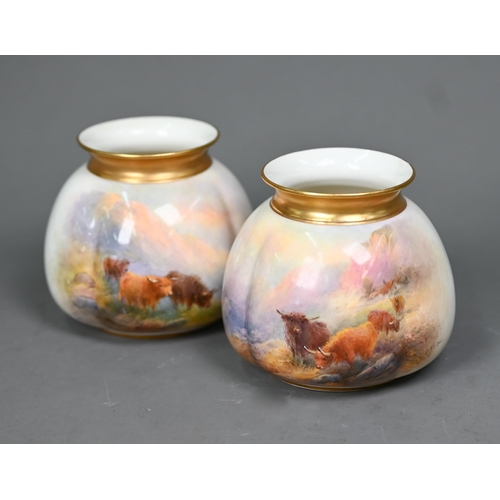 606 - A pair of Royal Worcester vases, with gilded rims, painted with Highland cattle by Harry Stinton, th... 