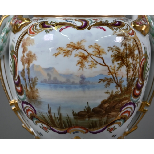 583 - A pair of 19th century French porcelain vases, the domed covers with fir-cone finials, the twin hand... 