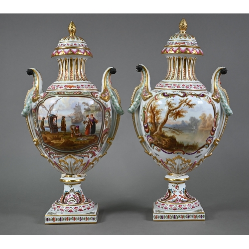 583 - A pair of 19th century French porcelain vases, the domed covers with fir-cone finials, the twin hand... 