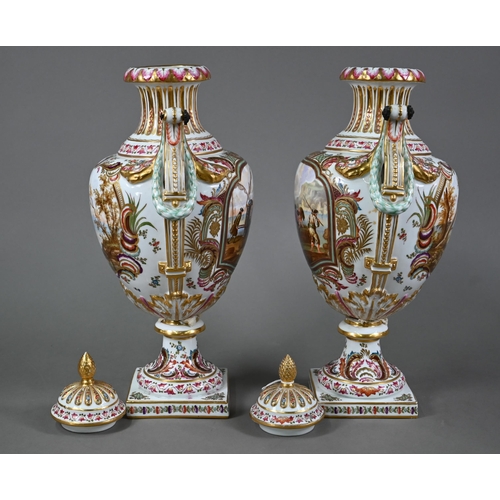 583 - A pair of 19th century French porcelain vases, the domed covers with fir-cone finials, the twin hand... 