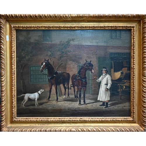 725 - W Turner - A groom with horses before a coach house, oil on panel, signed lower left, 39 x 51 cm