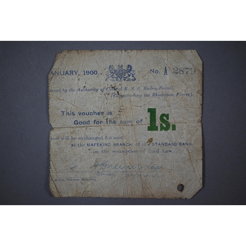 1064 - A Mafeking one shilling note no. 2879 issued January 1900, in worn condition