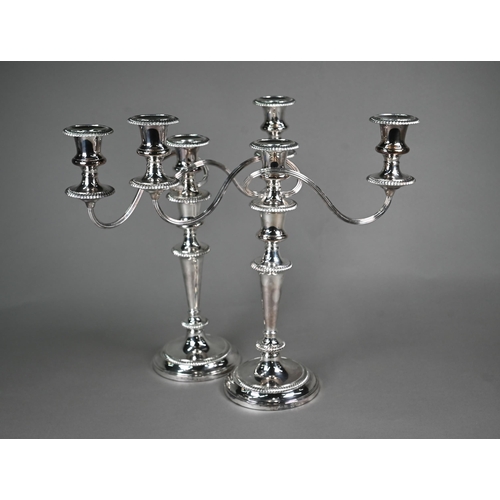1 - A pair of Barker-Ellis (Birmingham) epns three-sconce candelabra with baluster stems and gadrooned r... 