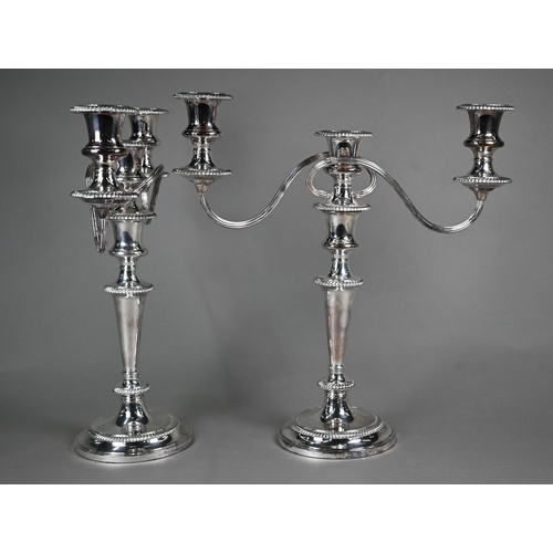 1 - A pair of Barker-Ellis (Birmingham) epns three-sconce candelabra with baluster stems and gadrooned r... 