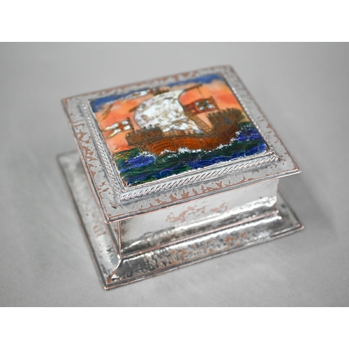 103 - Omar Ramsden: a plated on copper cigarette box, the hinged cover inset with enamelled galleon under ... 