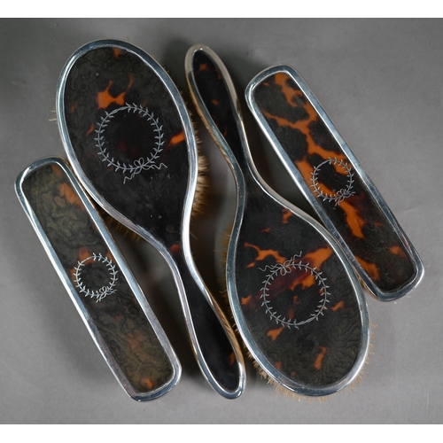 104 - A silver and piqué-work tortoiseshell five-piece brush set including hand-mirror, Synyer & Beddo... 