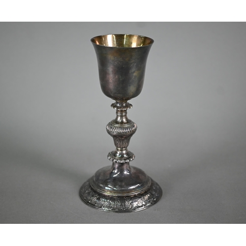 108 - An antique white metal chalice with gilded bowl and baluster stem (stamps underneath not recognised)... 