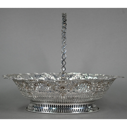 113 - A George III pierced silver basket with swing handle, on raised foot, William Plummer, London 1774, ... 