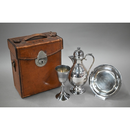 133 - A silver three-piece travelling Holy Communion set, comprising ewer with domed cover and cork stoppe... 