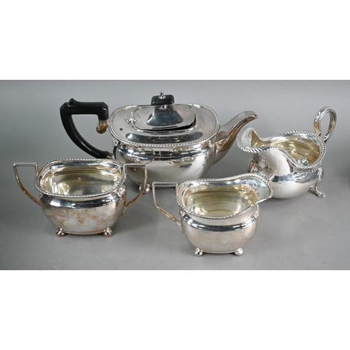 15 - An old Sheffield plate pot-bellied sauce-boat, to/w an epns three-piece tea service, a pair of short... 