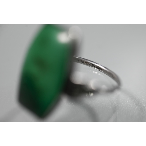 150 - An Art Deco style silver, malachite and cubic zirconia set cocktail ring, size P