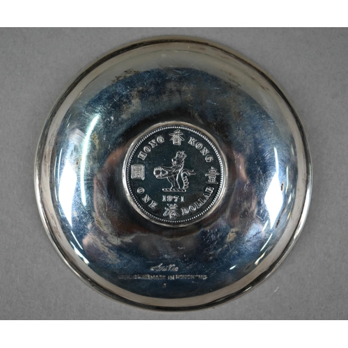 162 - A small silver Armada dish, London 1975 and a smaller example 1988, a small ashtray and a pin-dish, ... 