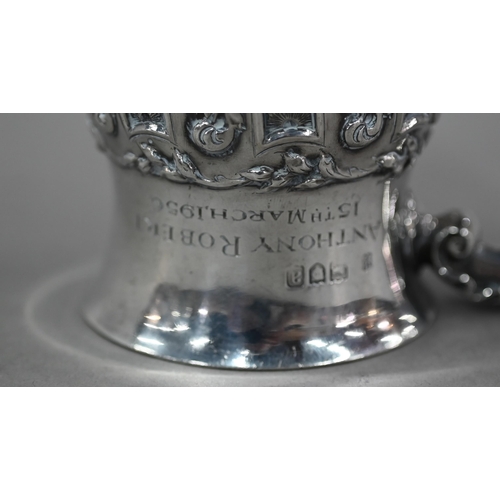 167 - A late Victorian heavy quality silver Christening mug with scroll handle and chased and writhen deco... 