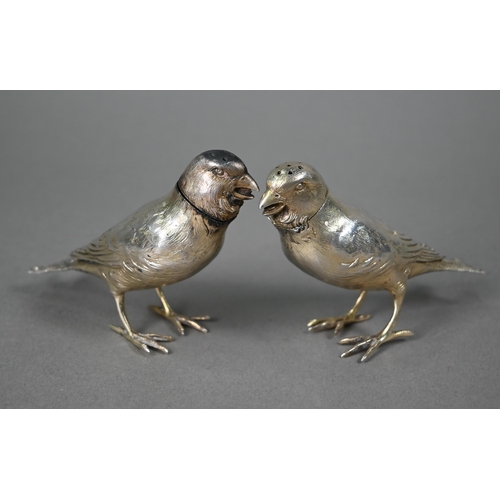 168 - A pair of Victorian silver novelty peppers, cast and chased as birds, with vestigial gilding, James ... 