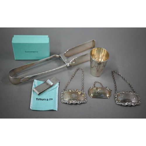 177 - An Edwardian silver pair of pastry/asparagus tongs, London 1902, 4.6oz, to/w a Tiffany & Co ster... 