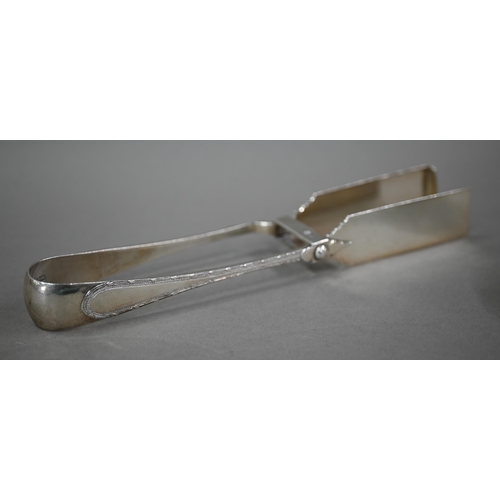 177 - An Edwardian silver pair of pastry/asparagus tongs, London 1902, 4.6oz, to/w a Tiffany & Co ster... 