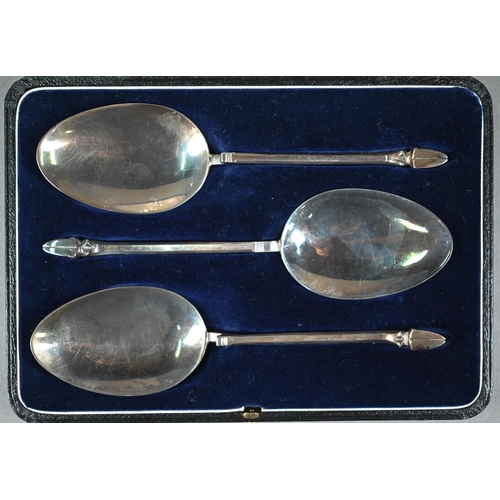 180 - A cased set of three Sterling serving spoons with cantilevered stems and goat's hoof finials, 5.8oz,... 