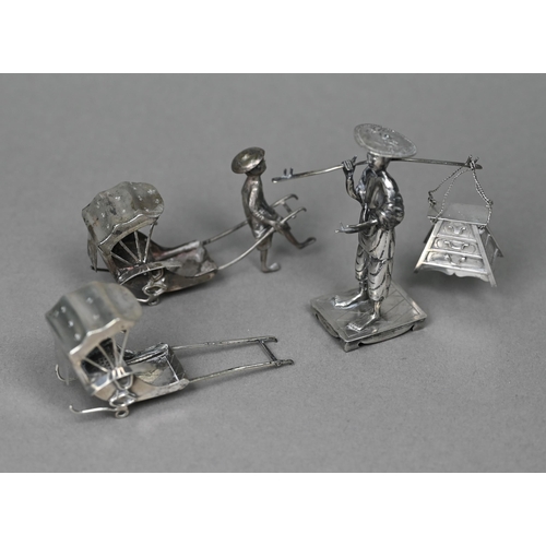 185 - A Chinese export silver figure of a tradesman, Wang Hing (lacks panniers), 8cm high, to/w a miniatur... 