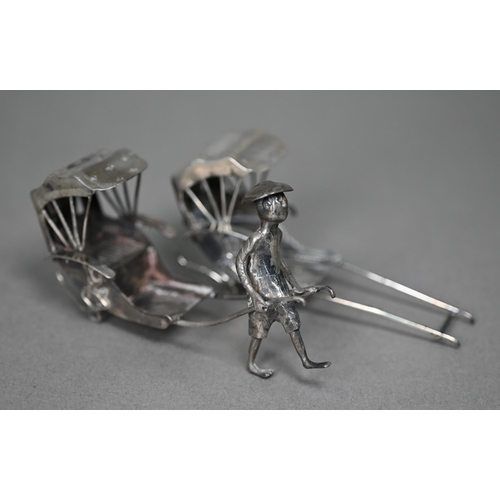 185 - A Chinese export silver figure of a tradesman, Wang Hing (lacks panniers), 8cm high, to/w a miniatur... 