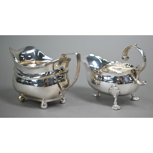 191 - A mid Georgian silver pot-bellied sauce-boat with cut rim, scroll handle and shell feet, engraved ba... 