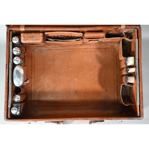 197 - An Edwardian leather suitcase with silver-mounted and other fittings, Thomas Jones Watson, London 19... 