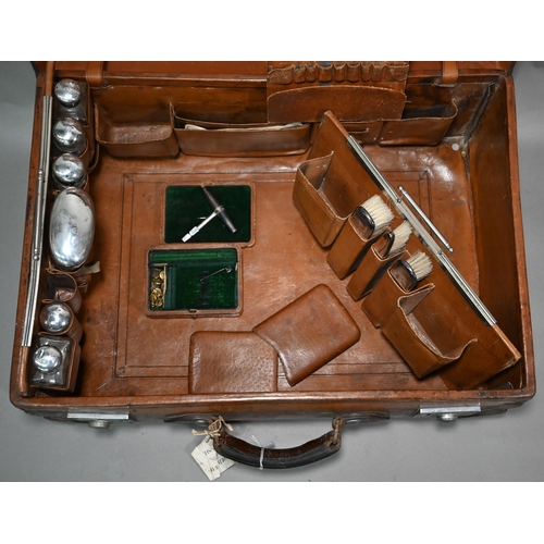 197 - An Edwardian leather suitcase with silver-mounted and other fittings, Thomas Jones Watson, London 19... 