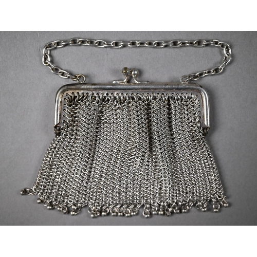 198 - A silver mesh evening bag with chamois leather lining, Chester import 1915, to/w a similar ep coin-p... 