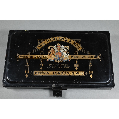 205 - An Edwardian artist's black japanned watercolour box, the hinged lid with gilded coat of arms and ma... 