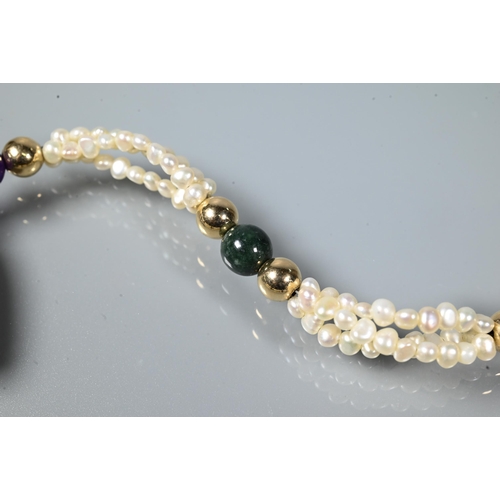 209 - A pearl necklace comprising a triple row of river pearls with hardstone beads and heart to centre, w... 