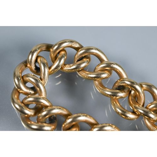 222 - A 9ct yellow gold curb bracelet with padlock and safety chain attached, approx 42.7g