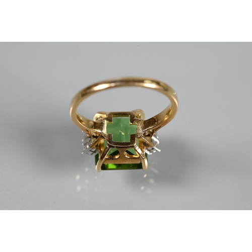 223 - A ring, the square cut green tourmaline with two diamonds to each shoulder, yellow and white metal s... 