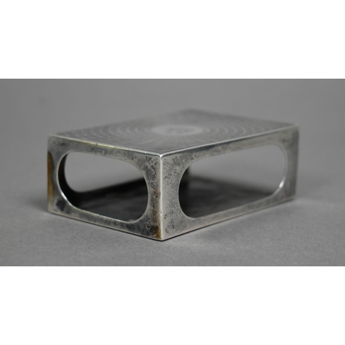 225 - A heavy silver table matchbox cover, with engine-turned cover and engraved crest of Elephant and Cas... 