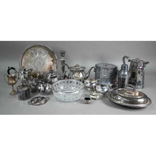 23 - A quantity of electroplated wares including biscuit-box, cocktail shaker, salver, coffee pot, etc. (... 