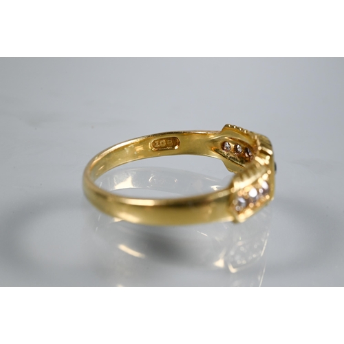 234 - An antique 18ct yellow gold ring set with blue sapphire to centre, with three diamonds to each shoul... 