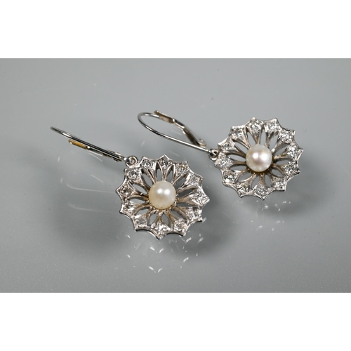 240 - A pair of drop earrings for pierced ears, the open daisy cluster with pearl to the centre and diamon... 