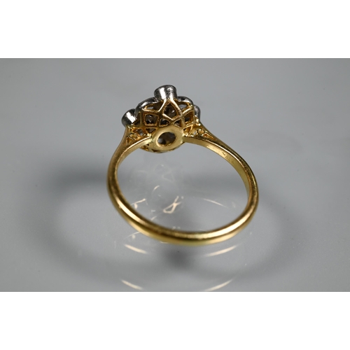 254 - An antique diamond cluster ring formed of nine mixed cut diamonds, yellow and white gold set, size M